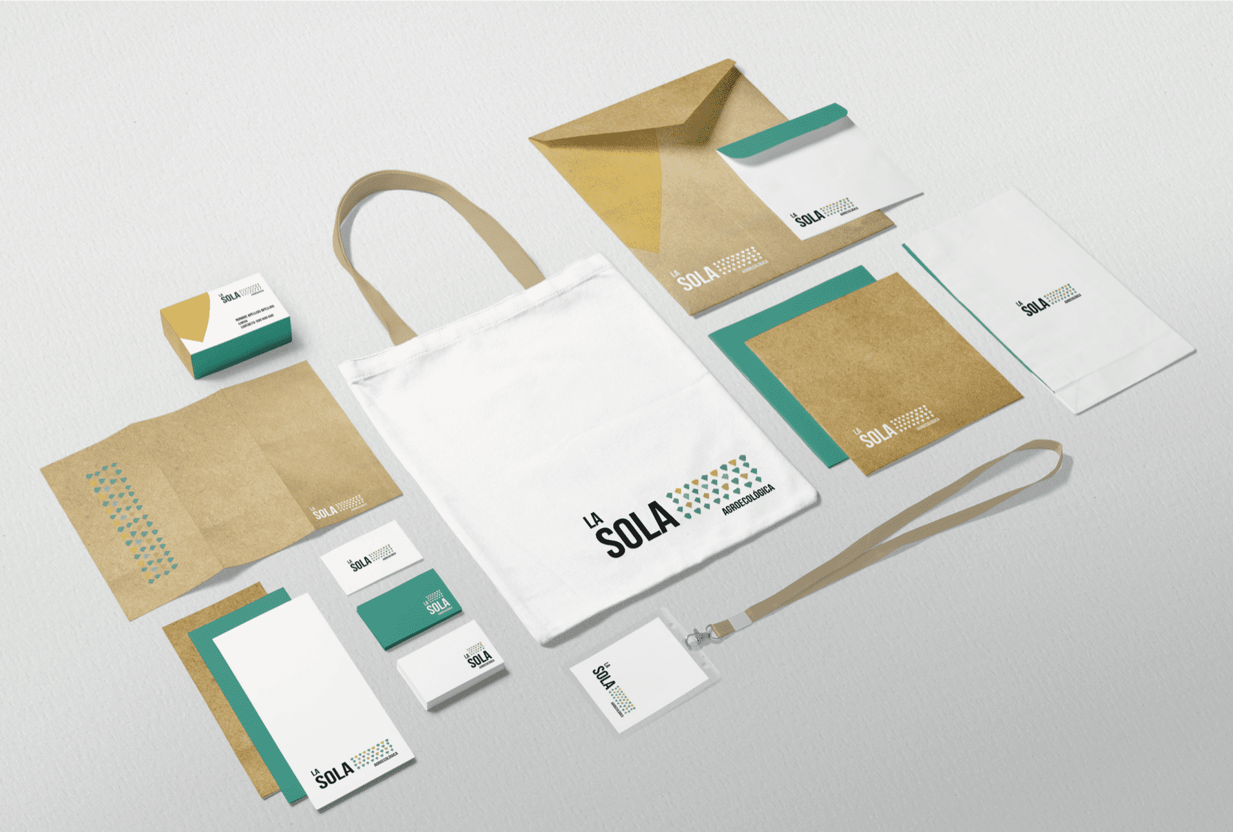 Ejemplo de aplicación de Identidad de la Escuela de emprendedoras Juana Millán en diferentes materiales: Bolsa de tela, triptico, tarjetas de visita, acreditación, sobre, díptico